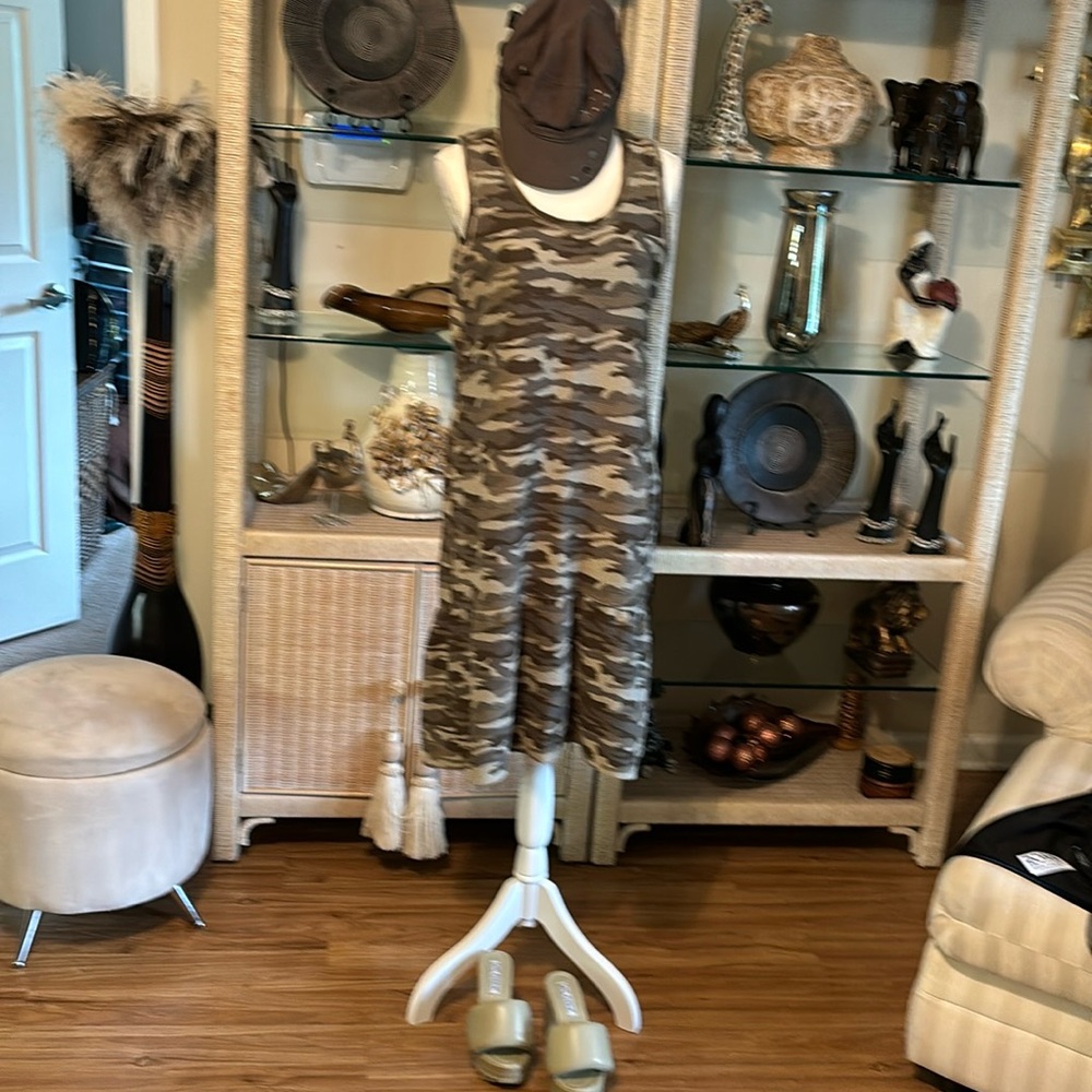 I am selling a army print dress with hat one size fits all green shoes size 6